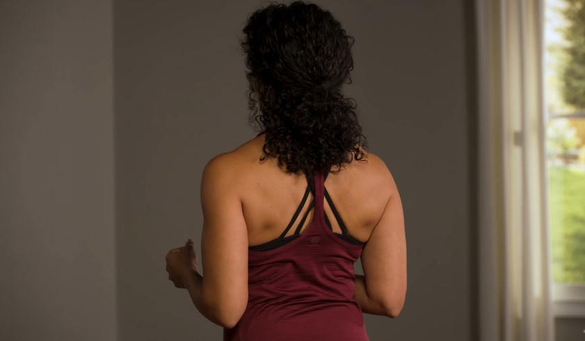 Woman doing shoulder blazer exercise