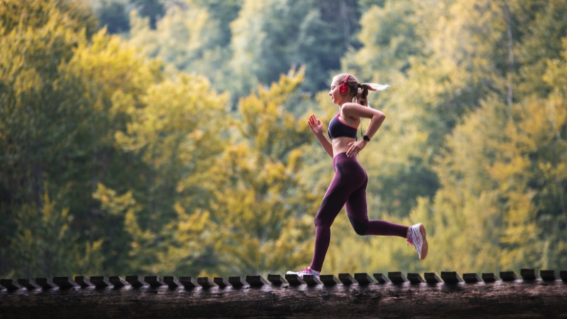 Woman running alone in nature