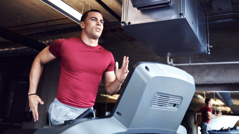 Man running on a treadmill to improve testosterone levels