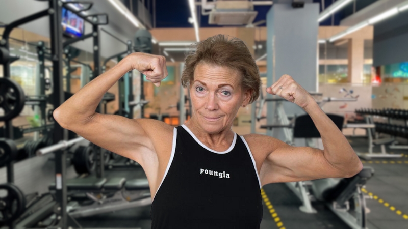 Marlene Flowers flexes confidently in a gym, showing the strength she built in her 70s