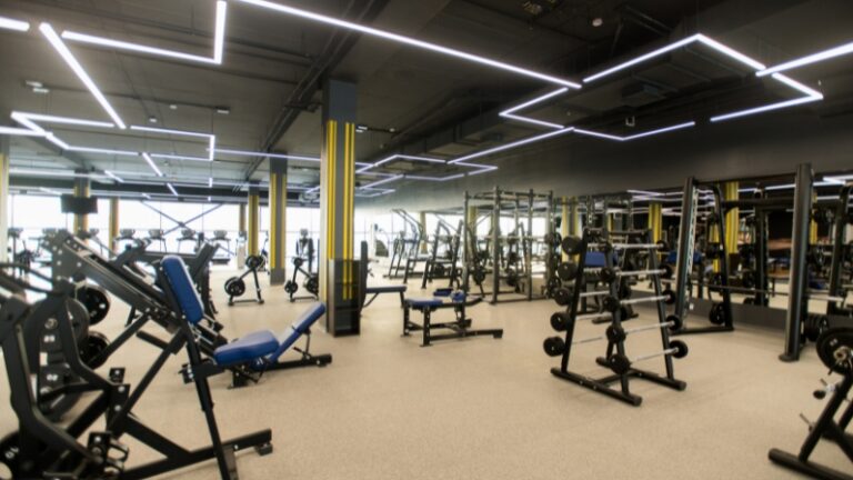 Gym with modern equipment showing what new gym owners must plan before opening