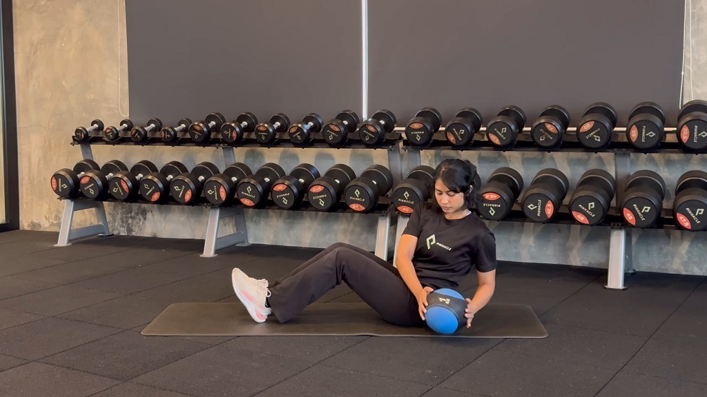 Russian twist with a medicine ball