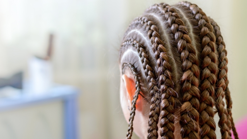 Close-up of tight Dutch braids styled neatly on the scalp