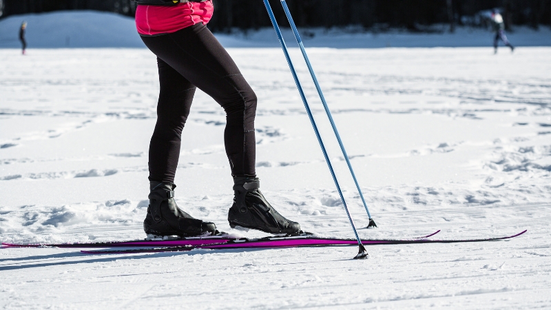 A skier moves across flat snow to show how ski sessions act as a real training stimulus