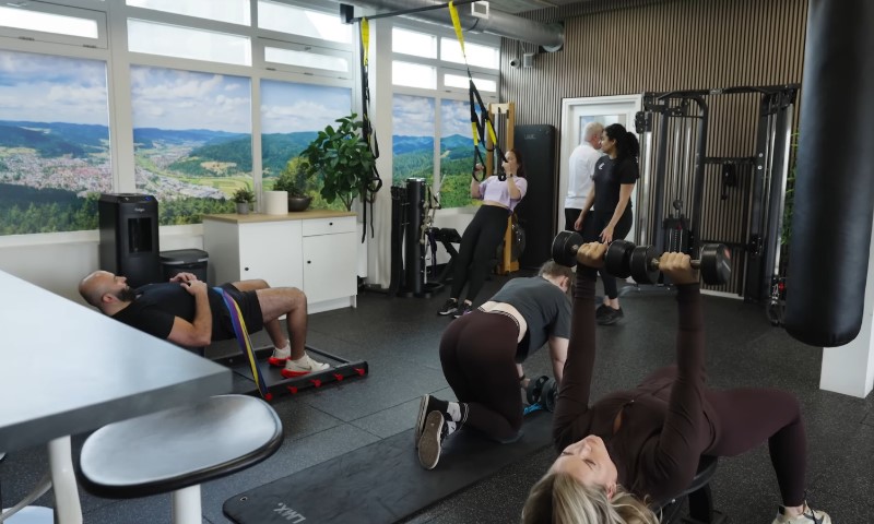 A gym with people exercising