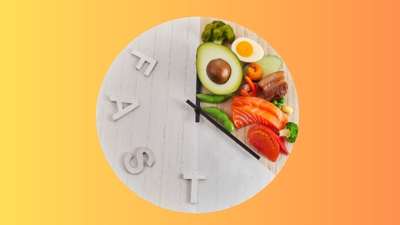 Clock graphic with protein-rich foods that represent fasting windows and strength-focused nutrition timing