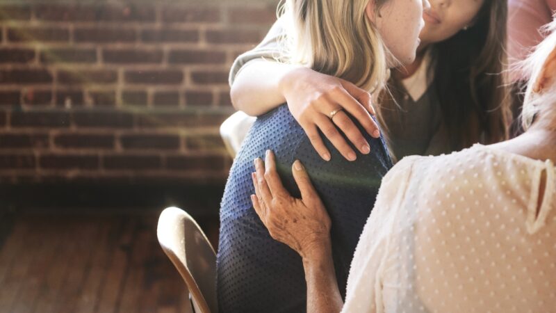 Women offer support in a quiet caregiver group